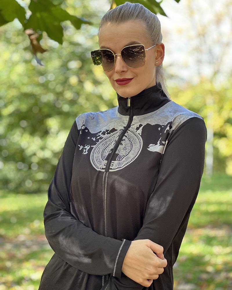 Women's black Sportalm turtleneck with silver ski applications