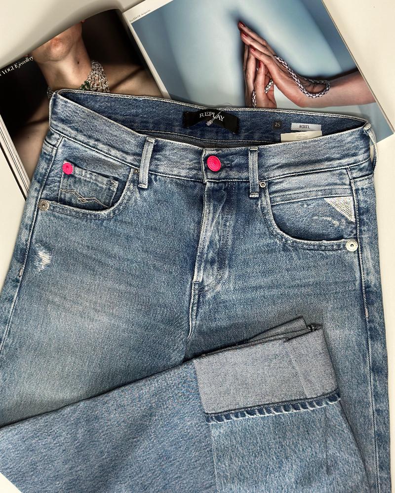 Women's jeans Replay light blue with a pink button