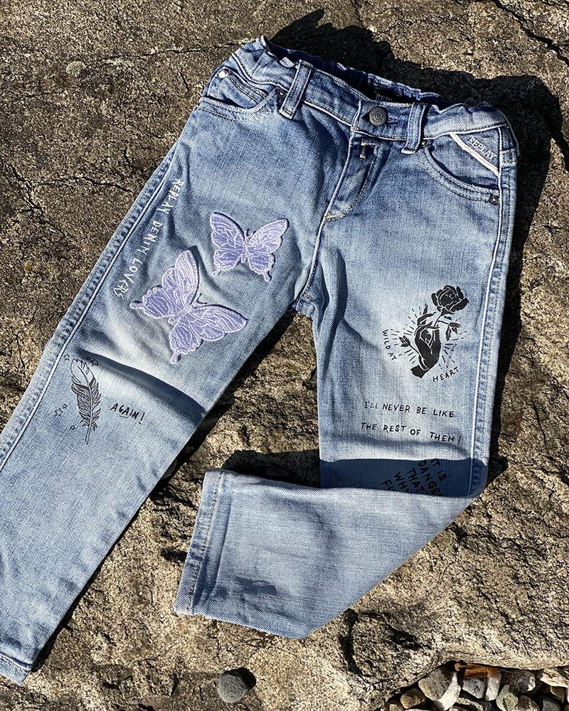 Replay children's jeans with inscriptions and patches