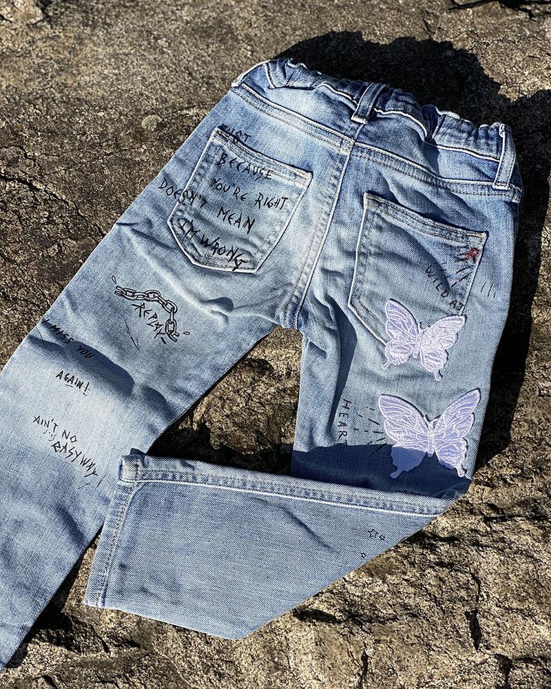 Replay children's jeans with inscriptions and patches