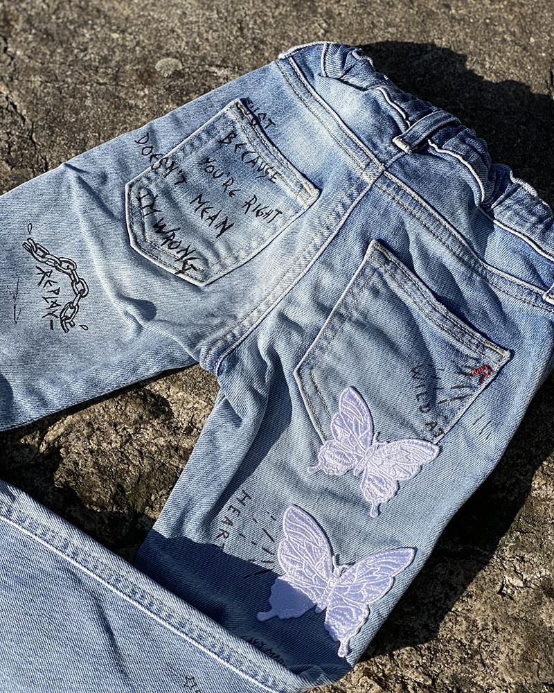 Replay children's jeans with inscriptions and patches